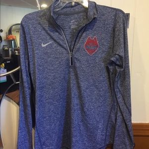 Long sleeve Nike shirt with UCONN logo.